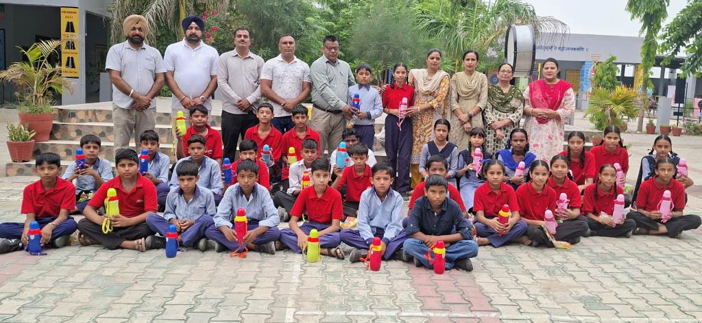 Water bottles distributed to students for relief from the heat